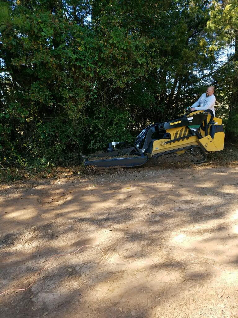 Using a Vermeer CTX100 mini skid steer to clear land in the Houston area