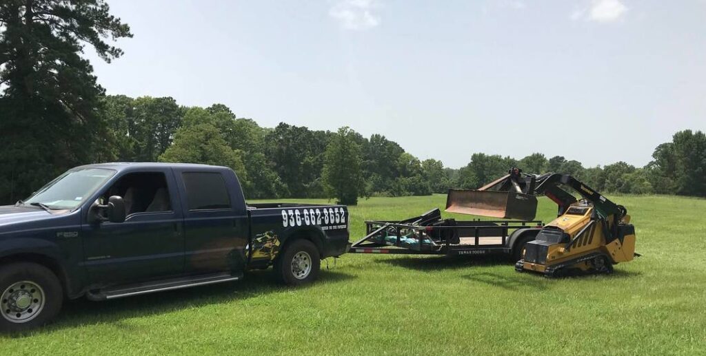 Fence Plus truck pulling Vermeer mini skid steer